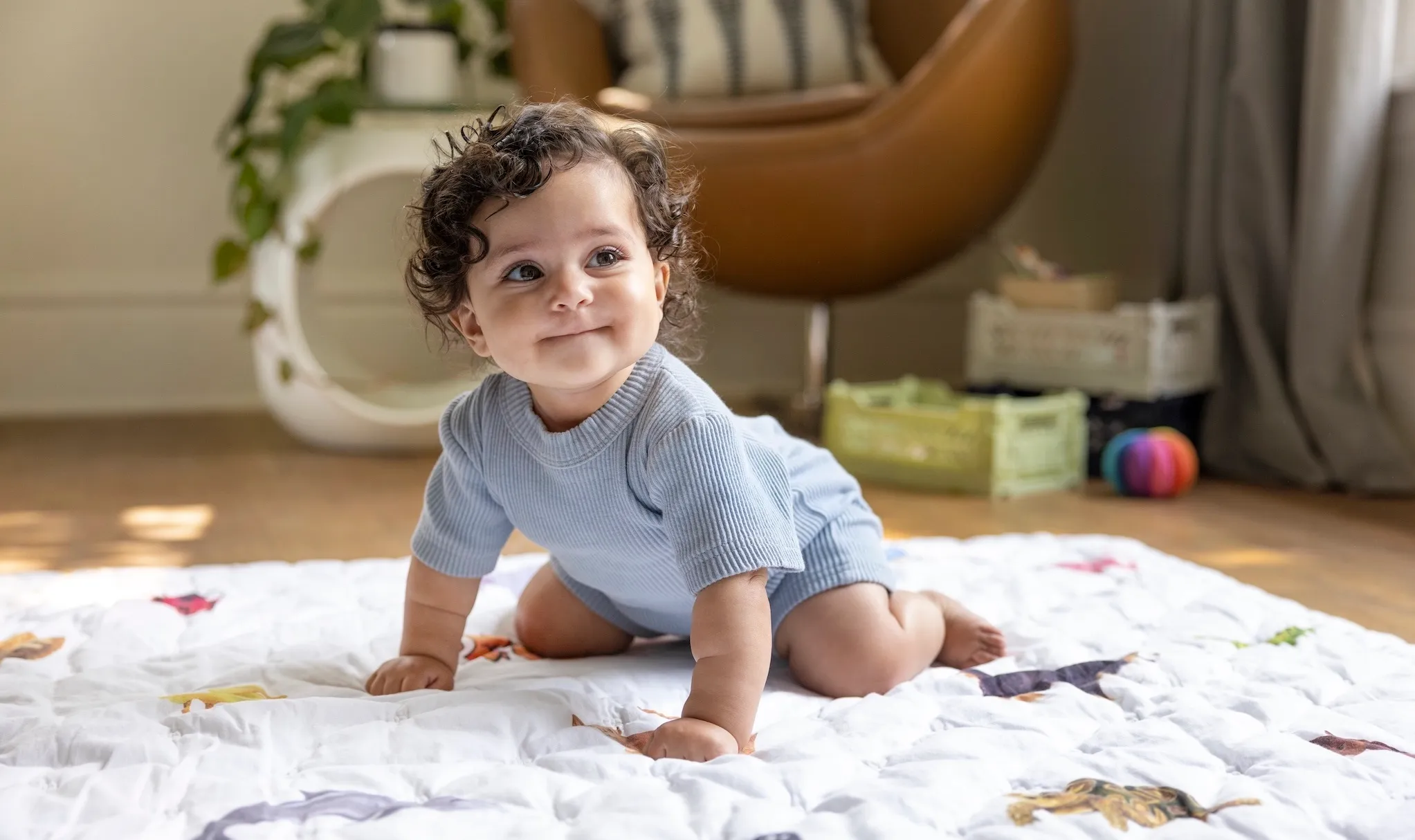 A small baby on carpet